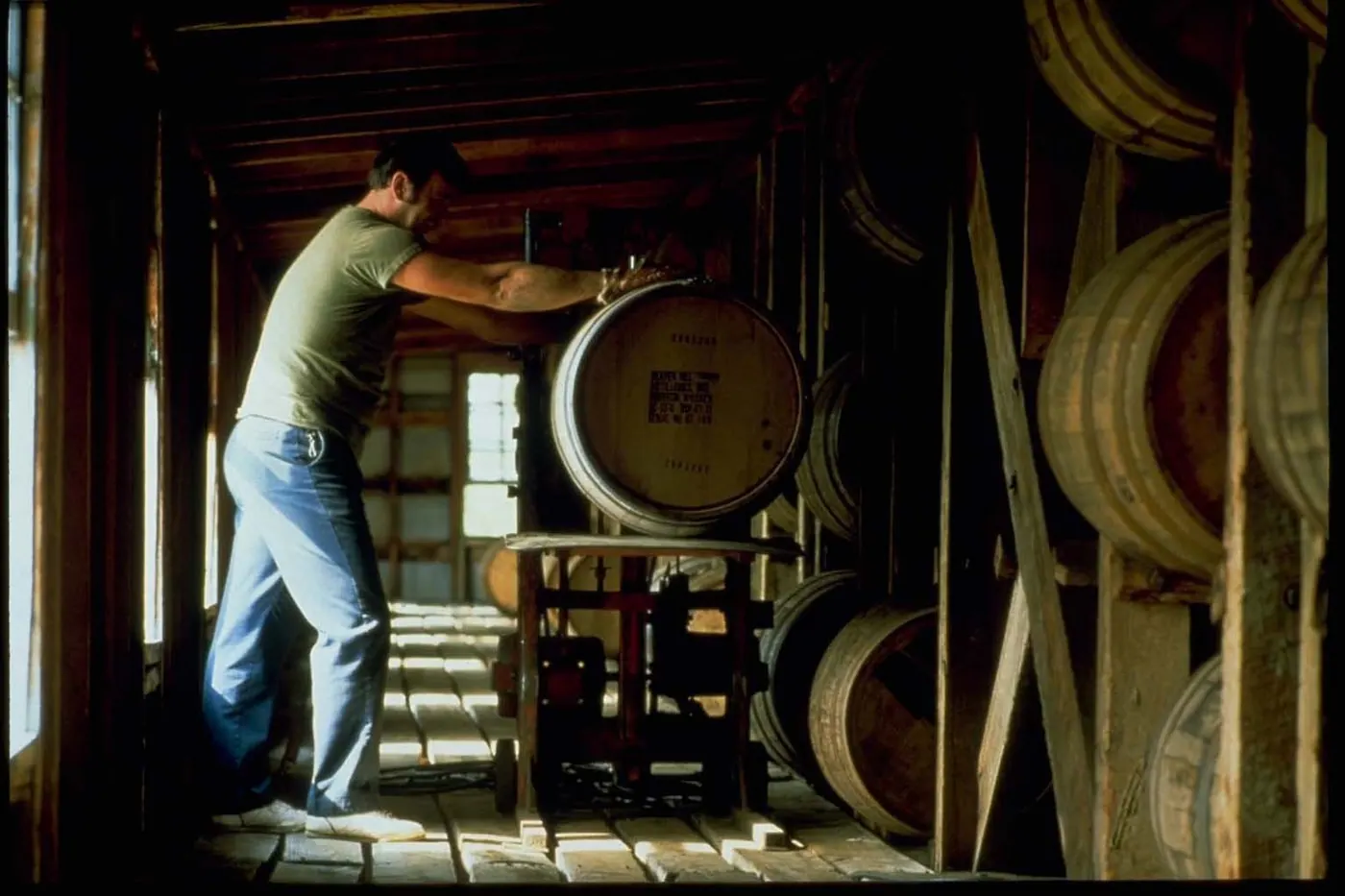 Bourbon Country — Lincoln Heritage Scenic Highway - Stacking Bourbon Barrels at Heaven Hill Distillery - NARA - 7720063