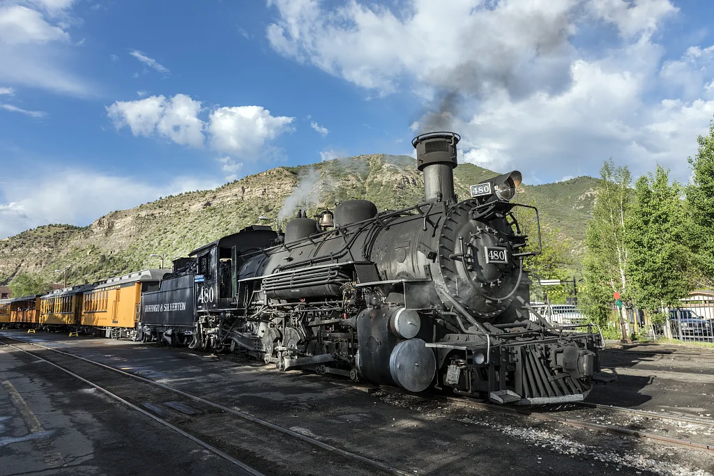 The Durango & Silverton Narrow Gauge Railroad (D&SNG) is powered up and ready to leave the Durango, Colorado, station