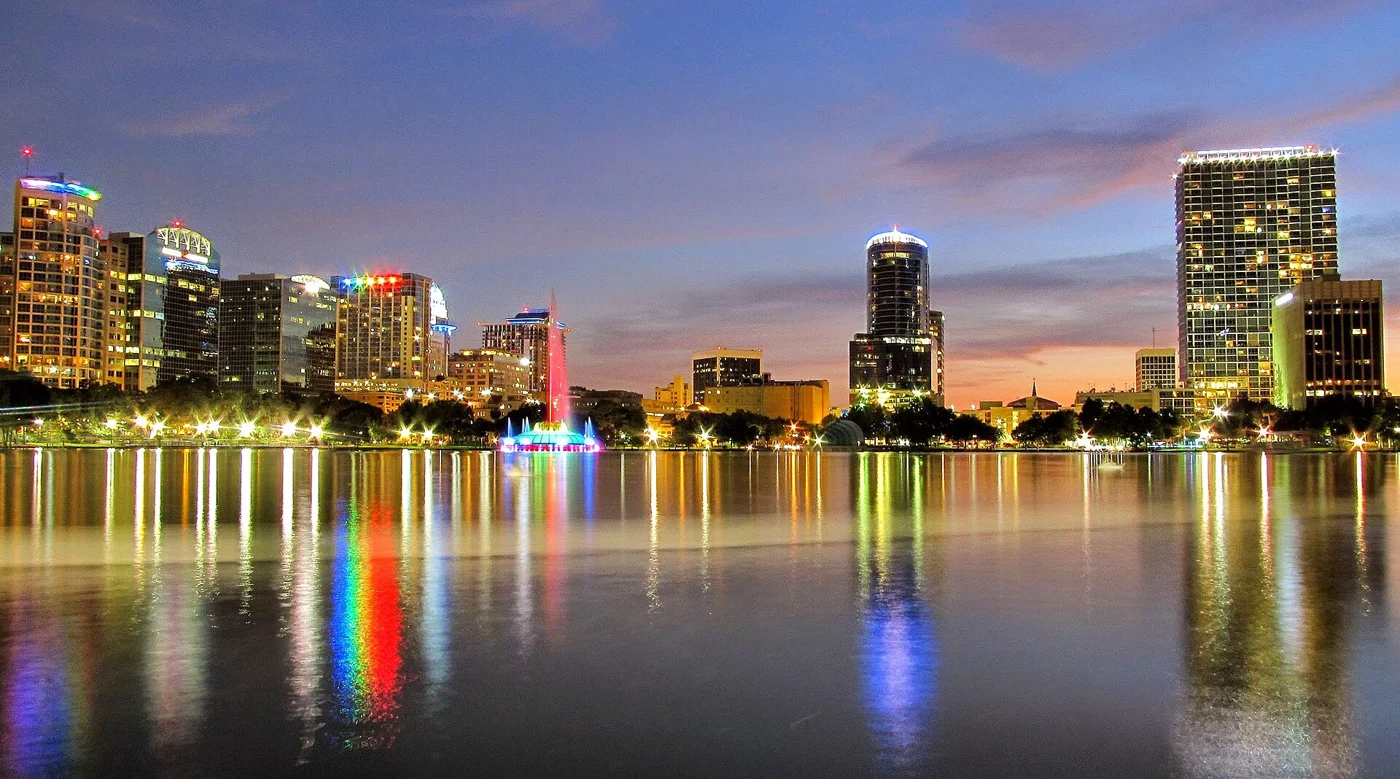 Orlando skyline reflected in Lake Eola at dusk