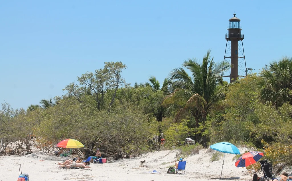 Beach and historic lighthouse on Sanibel Island