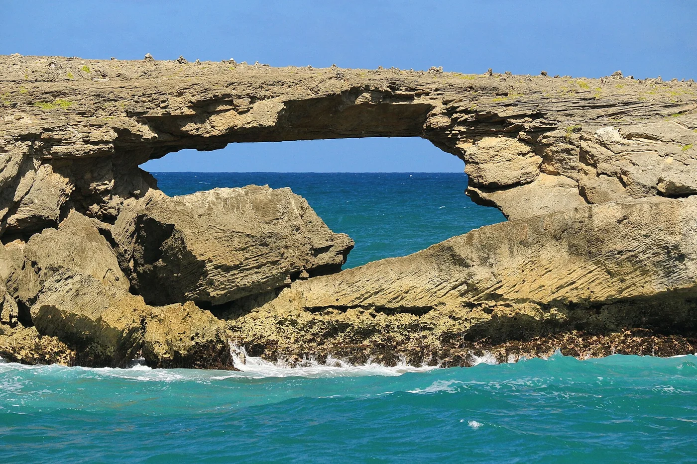 The offshore rock arch at Lāʻie Point