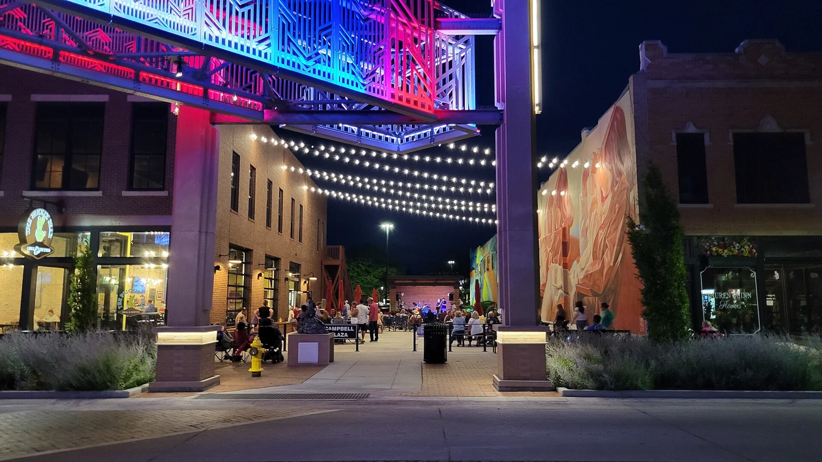 An illuminated performance space in downtown Salina, Kansas