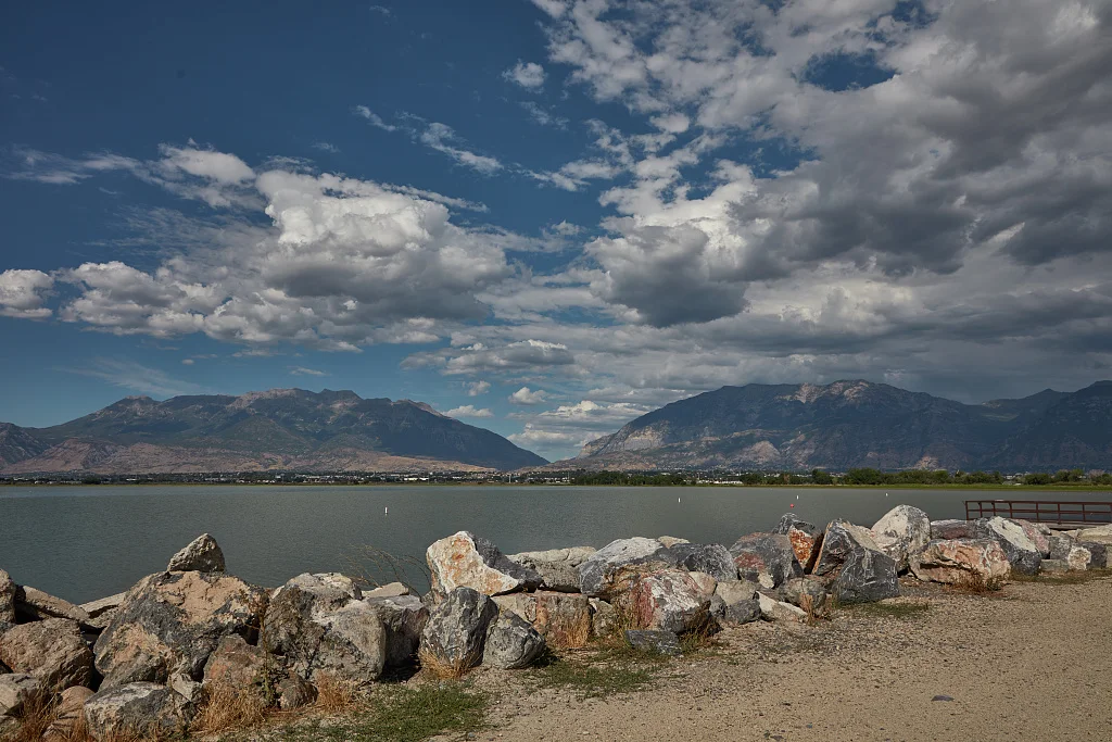 The nearby Wasatch Mountain range frames the Utah Lake State Park in Utah County, Utah, near Provo