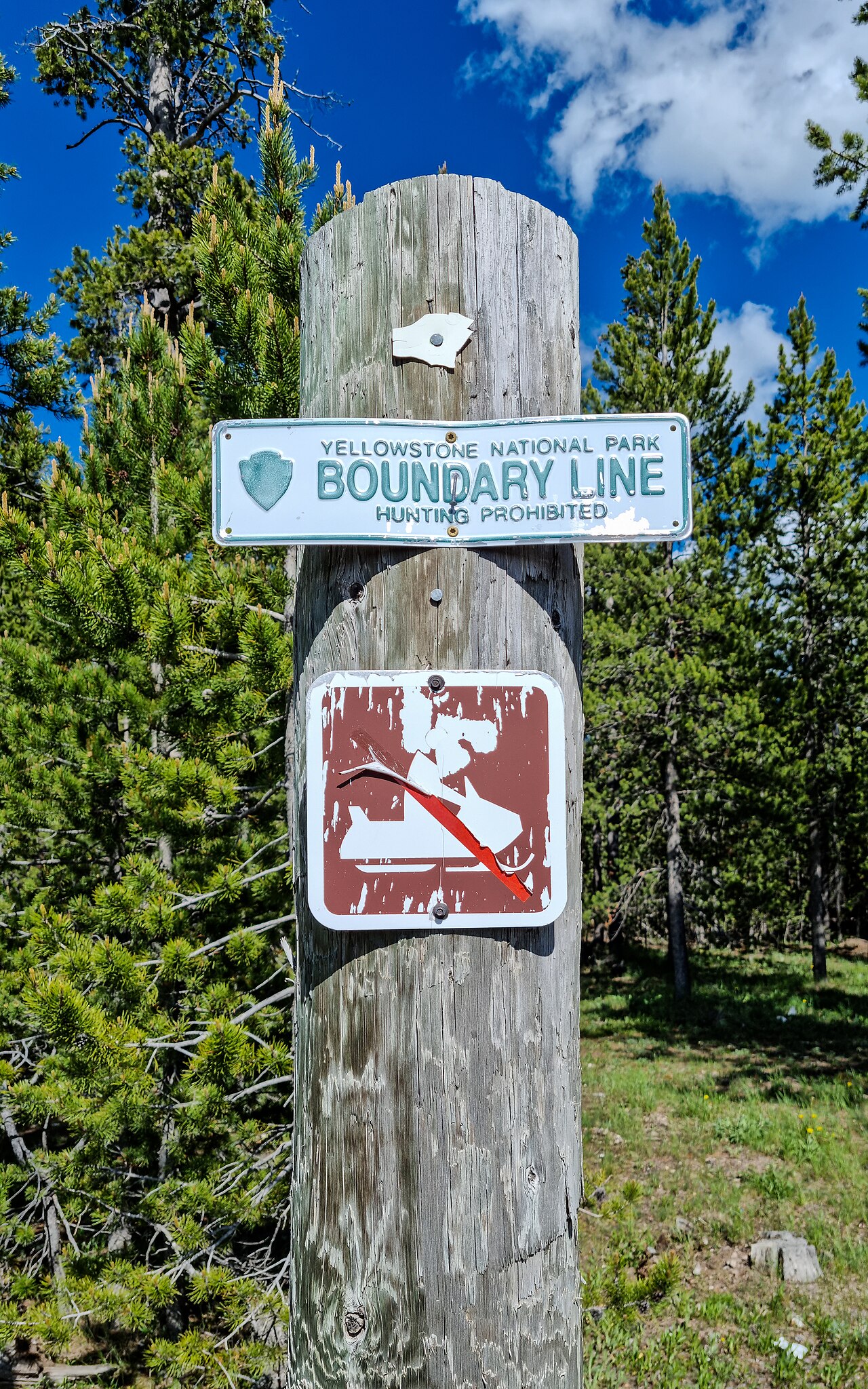 Yellowstone National Park boundary line at Boundary Street in West Yellowstone , Montana , USA Yellowstone National Park was founded on March 1, 1872, and is considered the world’s